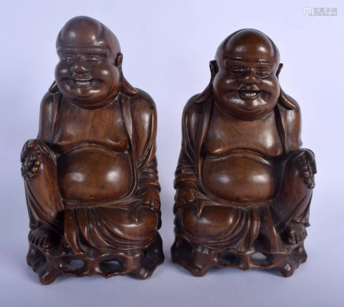 A PAIR OF 19TH CENTURY CHINESE CARVED HARDWOOD FIG…
