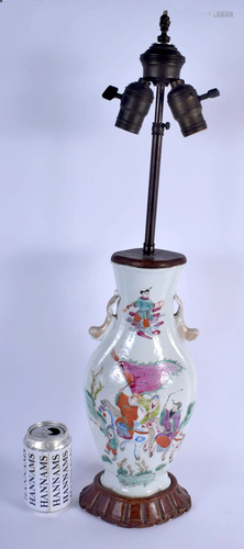 A 19TH CHINESE TWIN HANDLED FAMILLE ROSE PORCELAIN…