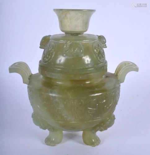 AN EARLY 20TH CENTURY CHINESE TWIN HANDLED JADE CEN…