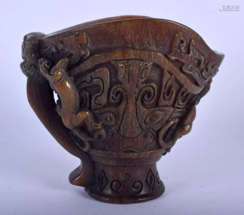 A CHINESE CARVED BUFFALO HORN TYPE LIBATION CUP 20th