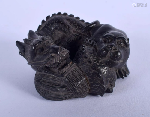 A JAPANESE CARVED BOXWOOD DRAGON OKIMONO. 5…