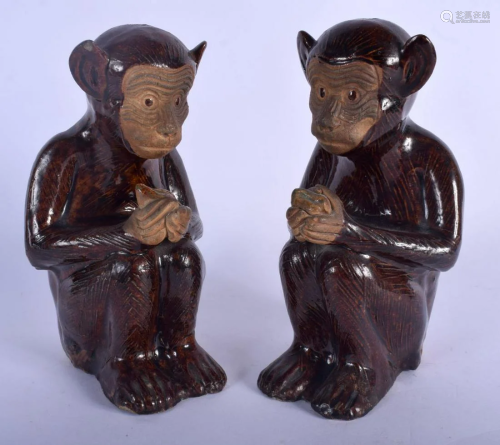 A PAIR OF CHINESE QING DYNASTY TREACLE GLAZED POTTERY
