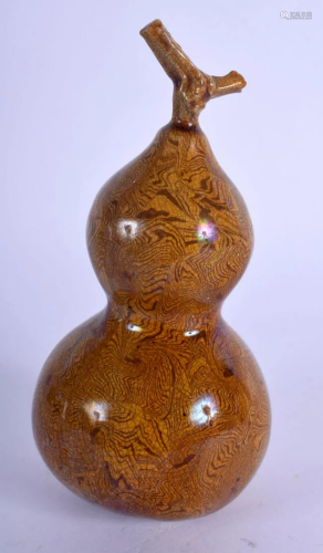 A 19TH CENTURY CHINESE TREACLE GLAZED POTTERY DOUBLE