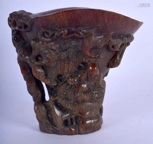 A CHINESE CARVED BUFFALO HORN STYLE LIBATION CUP 20th