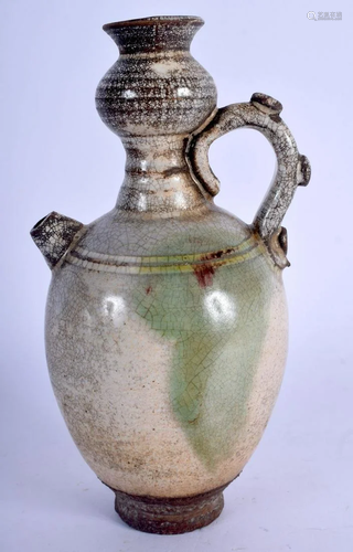 AN EARLY 20TH CENTURY CHINESE GREEN GLAZED EWER Late