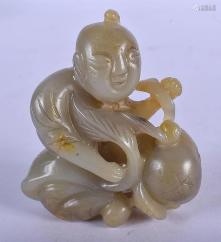 AN EARLY 20TH CENTURY CHINESE CARVED GREEN JADE FIGU…