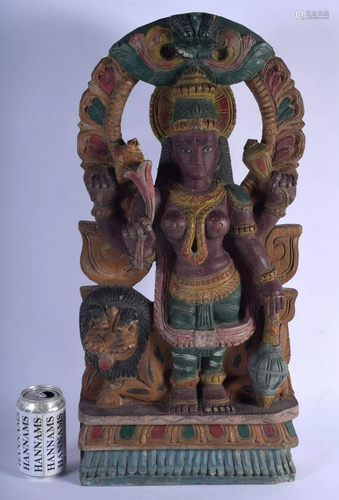 A LARGE INDIAN CARVED POLYCHROMED WOOD FIGURE OF …