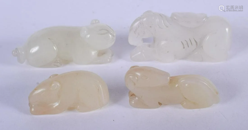 FOUR CHINESE CARVED JADE BEASTS 20th Century. Largest 4