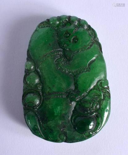 A CHINESE CARVED JADE PLAQUE 20th Century. 5 cm x 3 cm.