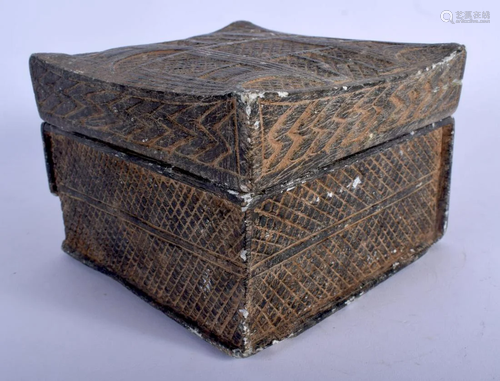 A MIDDLE EASTERN CARVED STONE BOX AND COVER possibly