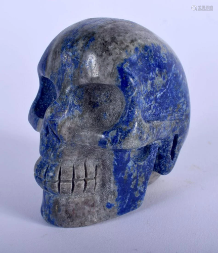 A CHINESE CARVED LAPIS LAZULI SKULL 20th Century. 7 cm