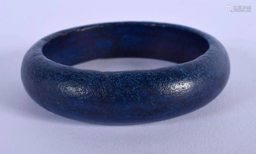 A CHINESE CARVED LAPIS LAZULI BANGLE 20th Century. 7 cm