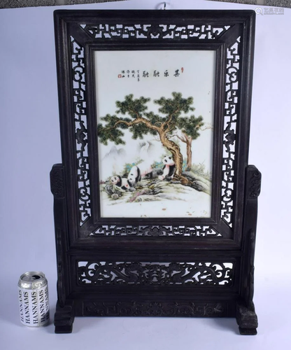 A CHINESE CARVED WOOD AND PORCELAIN SCREEN ON STAND