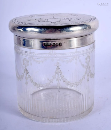 AN ANTIQUE SILVER TOPPED DRESSING TABLE JAR. London