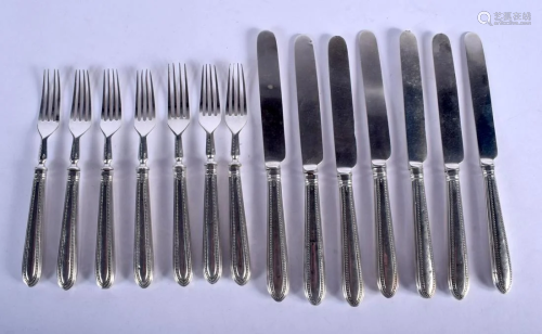 SILVER KNIVES AND FORKS. 630 grams. (qty)