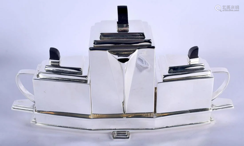 AN ART DECO STYLE SILVER PLATED THREE PIECE TEASET. 39