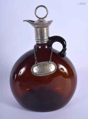 AN ART DECO SILVER AND AMBER GLASS WHISKEY JUG. London