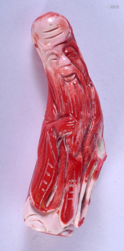 A VINTAGE CHINESE CARVED CORAL IMMORTAL. 7 cm high.