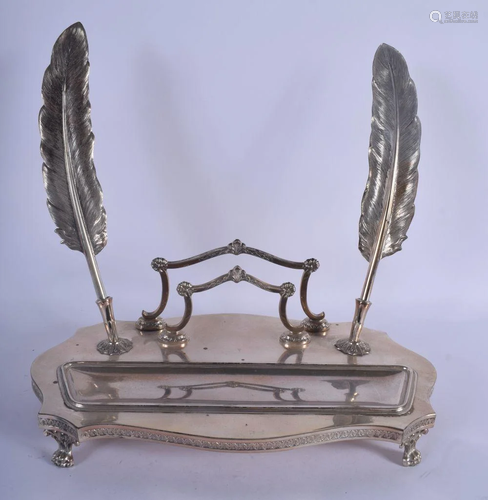 AN EARLY 20TH CENTURY CONTINENTAL WHITE METAL INKWELL