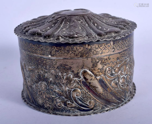 A VICTORIAN SILVER EMBOSSED BOX. London 1886. 217