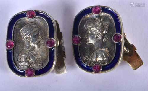 A PAIR OF CONTINENTAL SILVER AND ENAMEL GEM SET