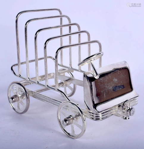 A NOVELTY SILVER PLATED CAR TOAST RACK. 12 cm x 17 cm.