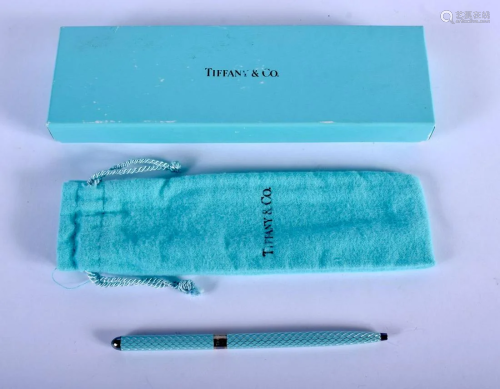 A BOXED TIFFANY & CO SILVER AND ENAMEL PEN. 14 grams.