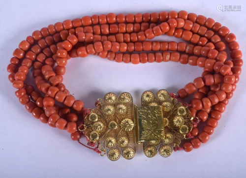 AN 18CT GOLD MOUNTED CONTINENTAL CORAL NECKLACE. 2…
