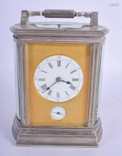 AN ANTIQUE SILVERED BRASS REPEATING CARRIAGE CLOCK. 18