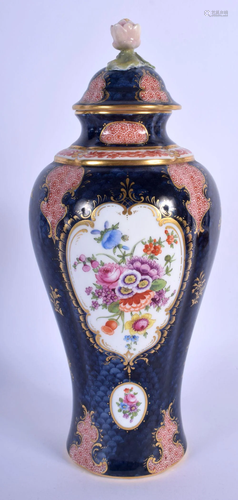 Royal Worcester vase and cover painted with flowers on