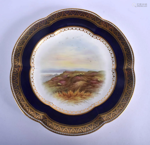 Coalport plate painted with a landscape under a blue