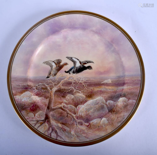 Eary 20th c. Royal Doulton plate painted with Black