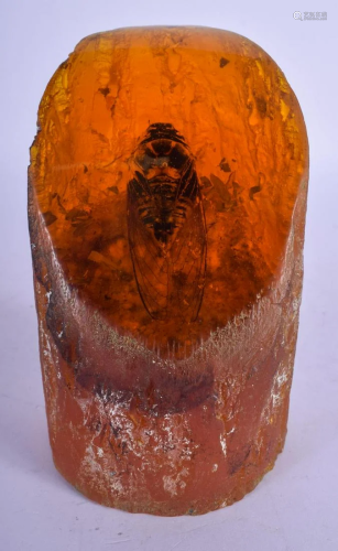 A SMALLER CONTEMPORARY CONTINENTAL CARVED AMBER