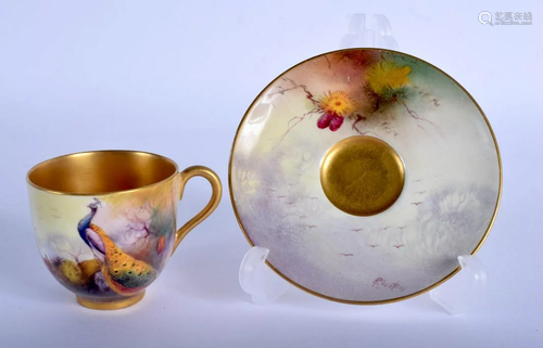 Royal Worcester coffee cup and saucer painted with a