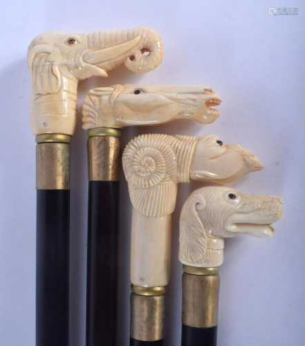 FOUR CONTINENTAL CARVED BONE WALKING CANES with