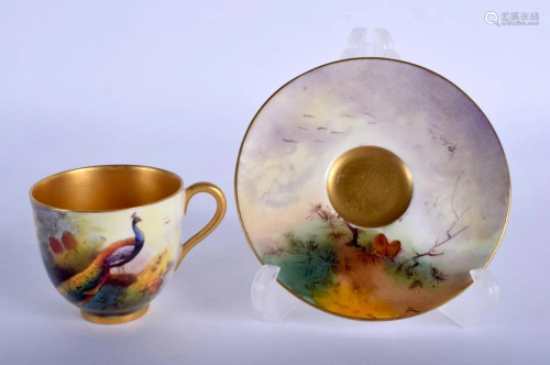 Royal Worcester coffee cup and saucer painted with a
