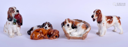 FOUR ROYAL DOULTON FIGURES OF HOUNDS. Largest 11 c…