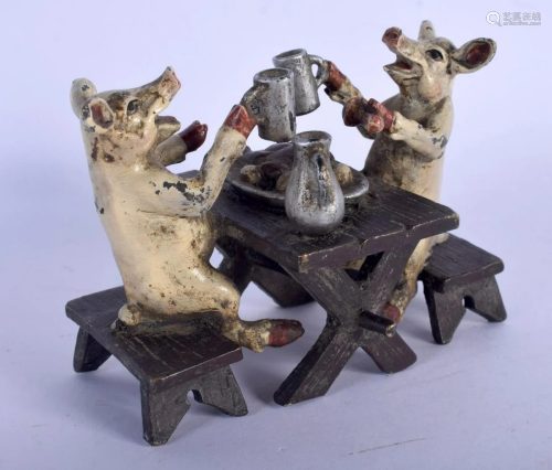 A CONTEMPORARY COLD PAINTED BRONZE GROUP OF PIGS. …