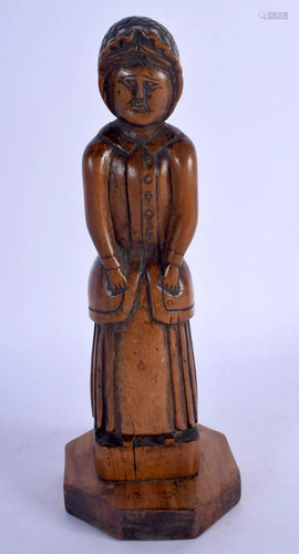 AN 18TH CENTURY EUROPEAN CARVED FRUITWOOD FOLK ART