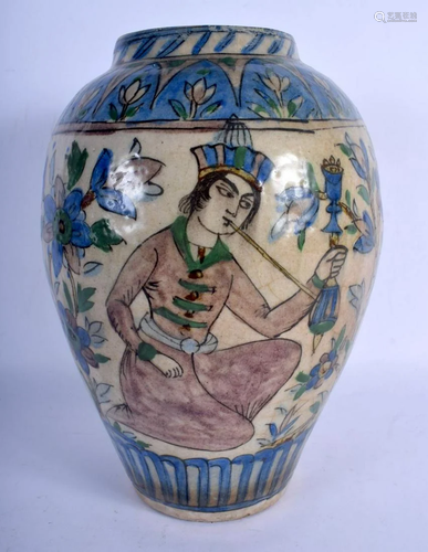 AN ANTIQUE PERSIAN QAJAR FAIENCE GLAZED VASE. 30 cm x