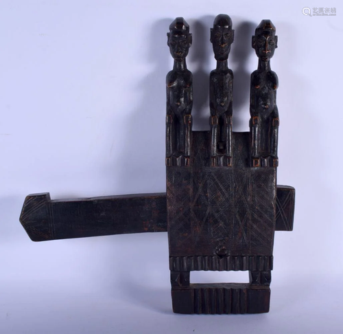 AN EARLY 20TH CENTURY AFRICAN DOGON TRIPLE FIGURE D…