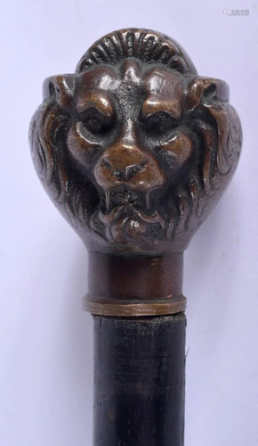 A CONTEMPORARY BRONZE HEADED DOUBLE LION HEAD WALKI…