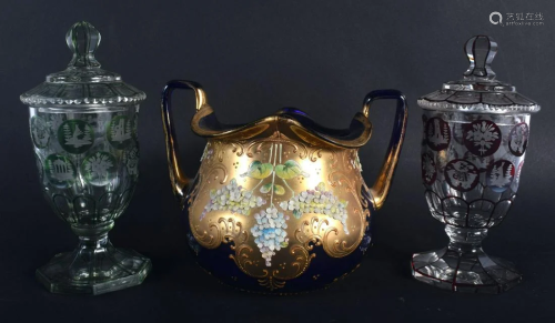 A PAIR OF BOHEMIAN GLASS CUPS AND COVERS together with