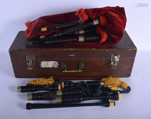 A CASED SET OF VINTAGE SCOTTISH BAGPIPES within fitted