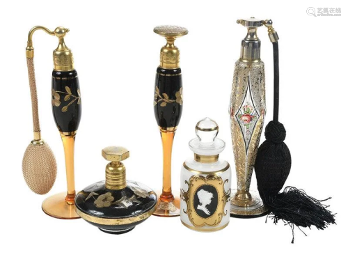 Five Black and Gilt Perfume and Atomizer Bottles