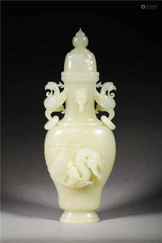 A DECORATIVE HETIAN WHITE JADE VASE