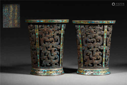 A PAIR OF BRONZE DISPLAY OBJECTS