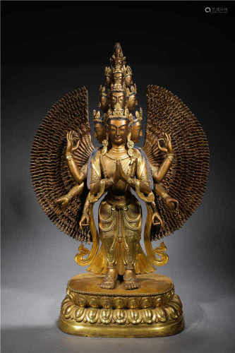 A MULTI-HANDS GILDED BRONZE GUANYIN STATUE