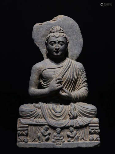 A STONE BUDDHIST STATUE