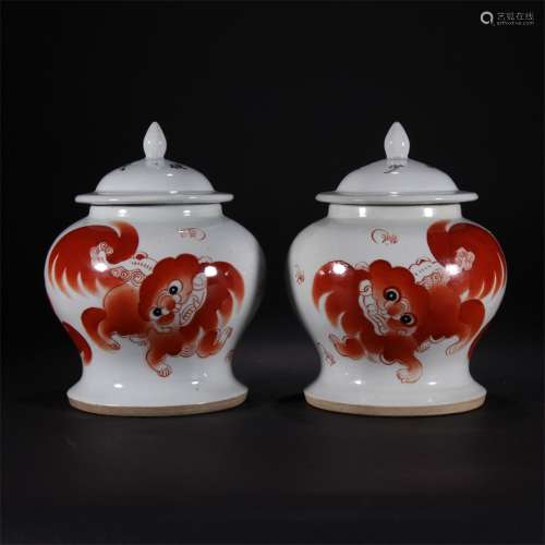 A PAIR OF BLUE AND WHITE ALUM RED GENERAL JARS, QING DYNASTY...